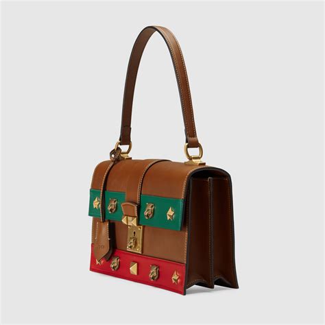 gucci cat lock leather top handle 421997 brown satchel|Gucci top handles women.